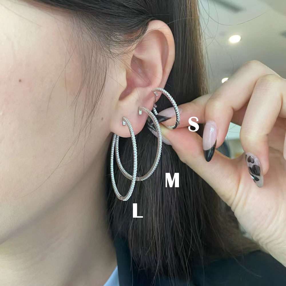 Boucles d'oreilles créoles coeur en argent sterling