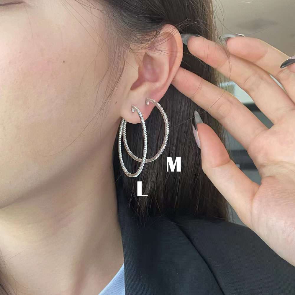 Boucles d'oreilles créoles coeur en argent sterling